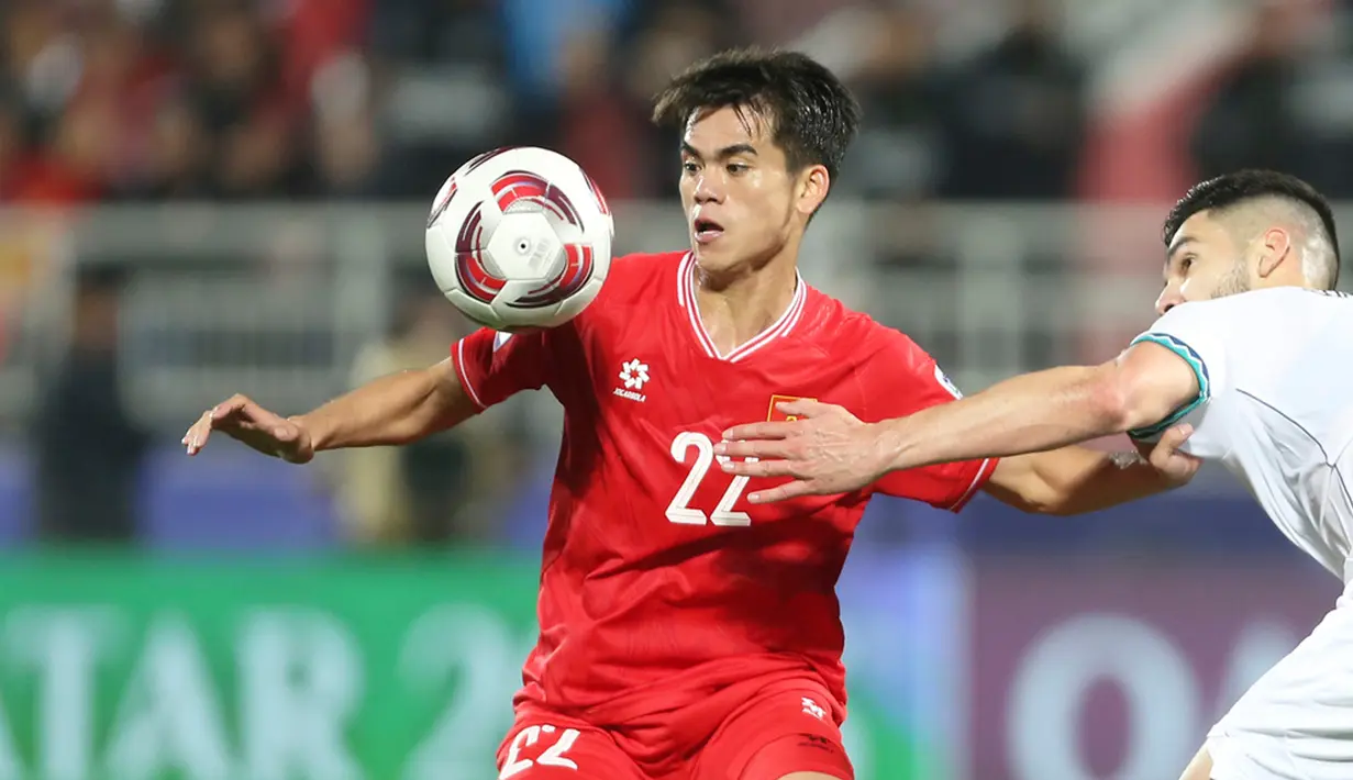 Menit ke-51, Vietnam kembali menggila. Untung saja tendangan Kuat Van Khang masih menyamping sehingga skor tetap 1-0. (AP Photo/Hussein Sayed)