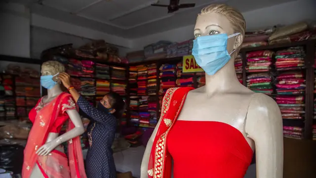 FOTO: India Longgarkan Pembatasan Terkait COVID-19