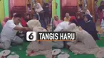 Tangis sang ayah itu kembali pecah ketika anaknya meminta doa restu dan mencium tangannya.