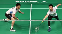 Sempat mengalami kesulitan di awal pertandingan, Mohammad Ahsan/Hendra Setiawan berhasil bangkit dan mengejar ketertinggalan. (Saeed KHAN/AFP)