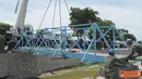 Citizen6, Haiti: Prajurit TNI yang tergabung dalam Satgas Kompi Zeni TNI Kontingen Garuda XXXII-A/MINUSTAH dipimpin Letkol Czi Winarno, berhasil menyelesaikan pembuatan jembatan di kawasan kanal, Gonaives, Haiti. (Pengirim: Badarudin Bakri) 