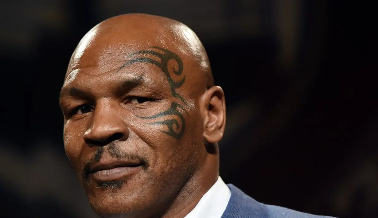 Petinju Mike Tyson pernah mendekam dipenjara pada tahun 1992 atas tuduhan pemerkosaan yang menimpa kontestan Miss Black America, Desiree Washington. (Ethan Miller/Getty Images/AFP)