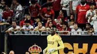 Penjaga gawang Manchester United, Andre Onana, saat pertandingan pramusim Soccer Champions Tour 2023 melawan Real Madrid yang berlangsung di NRG Stadium, Texas, Kamis (27/7/23). (Twitter/@ManUtd)