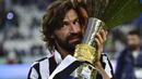 Empat trofi Scudetto, sekali Coppa Italia, dan dua kali Piala Super Italia pernah dipersembahkannya. Andrea Pirlo mencatatkan 164 penampilan dengan 19 gol dan 38 assist. (AFP/Giuseppe Cacace)