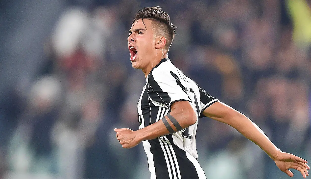 Paulo Dybala merayakan golnya ke gawang Udinese pada lanjutan Serie A Italia di Stadion Juventus, Turin, Minggu (16/10/2016) dini hari WIB. (EPA/Alessandro Di Marco)