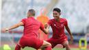 Keceriaan Marselino Ferdinan disesi pemanasan sebelum latihan Timnas Indonesia jelang pertandingan perdana Piala AFF 2022 dimulai di Stadion Gelora Bung Karno, Selasa (20/12/2022). (Bola.com/Abdul Aziz)
