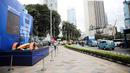 Suasana di lokasi pameran mobil balap listrik di Bundaran HI. (Liputan6.com/Faizal Fanani)