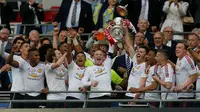 Manchester United meraih gelar juara Piala FA 2015-16 setelah mengalahkan Crystal Palace 2-1 di Stadion Wembley, Sabtu (21/5/2016). (AFP/Ian Kington)