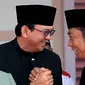 Basuki Tjahaja Purnama (Ahok) dan Abraham Lunggana (Haji Lulung) saat di Lebaran Betawi, Jakarta (14/9/2014) (Liputan6.com/Faisal R Syam)