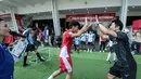 Pemain Timnas Indonesia U-17, Muhammad Mierza melakukan selebrasi setelah mencetak gol dalam acara coaching clinic bersama Nagoya Grampus di Garuda Store, GBK, Senayan Jakarta, Jumat (26/06/2025) pagi WIB. (Bola.com/Bagaskara Lazuardi)