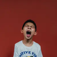 Ilustrasi anak yang memiliki permasalahan emosi.(Foto: Unsplash/Xia Yang)