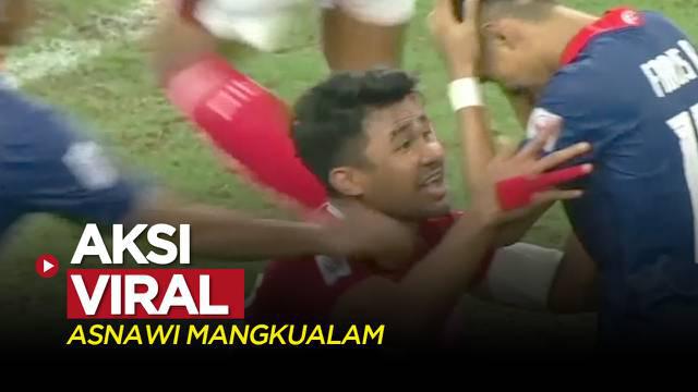 Berita video momen aksi pemain Timnas Indonesia, Asnawi Mangkualam, yang menjadi viral saat menghadapi Singapura pada laga leg 2 semifinal Piala AFF 2020, Sabtu (25/12/2021).