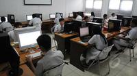 Ujian Nasional Berbasis Komputer (UNBK) SMP 2018 dilaksanakan pada 23-26 April 2018. (Foto: Liputan6.com)
