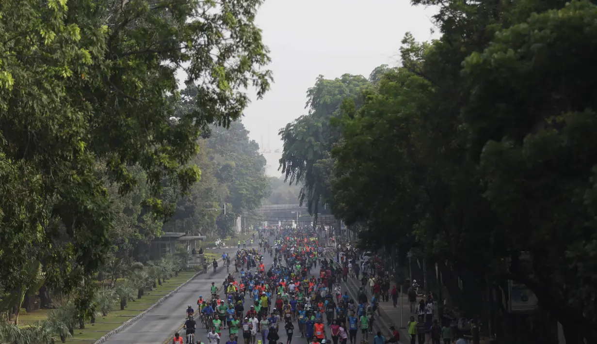 Sebanyak 15.000 pelari ambil bagian pada ajang Mandiri Jakarta Marathon 2015. (Bola.com/Vitalis Yogi Trisna)