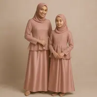 Gamis Brokat Kombinasi Satin dengan Aksen Peplum (image by chatgpt)