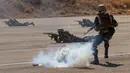 Pasukan elite Suriah mengikuti latihan militer yang dipimpin oleh tentara Rusia di sebuah pangkalan militer di Yafour, Suriah, Selasa (24/9/2019). Pasukan elite Suriah mendapat pelatihan pertempuran lapangan. (AP Photo/Alexander Zemlianichenko)