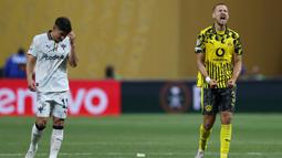 Borussia Dortmund berhasil melangkah ke 8 besar Piala Dunia Antarklub 2025 usai menumbangkan Monterrey dengan skor 2-1. (CHARLY TRIBALLEAU/AFP)