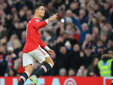 Cristiano Ronaldo membuktikan dirinya seorang GOAT usai mencetak tiga gol dan menyelamatkan muka Manchester United dari kekalahan atas Tottenham. (AFP/Lindsey Parnaby)