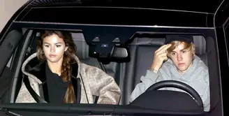 Justin Bieber dan Selena Gomez seperti tak terpisahkan. Usai liburan ke Jamaika, mereka kini pergi ke Gereja bersama. (BACKGRID/USMagazine)