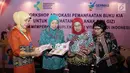Dirjen Kesehatan Masyarakat MQIH Kirana Pritasari didampingi Sri Kusyuniati, Eni Gustina dan Laksmi Widyastuti saat Workshop Advokasi Pemanfaatan Buku KIA untuk kesehatan Ibu dan Anak, Jakarta, Rabu (19/9). (Liputan6.com/HO/Reza)