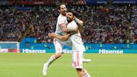Pemain Spanyol, Diego Costa (kanan) merayakan gol usai mencetak gol ke gawang Iran dalam penyisihan Grup B Piala Dunia 2018 di Kazan Arena, Kazan, Rusia, Rabu (20/6). Gol tunggal Costa membawa Spanyol menumbangkan Iran. (AP Photo/Frank Augstein)