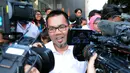 Bupati Empat Lawang Budi Antoni Aljufri usai menjalani pemeriksaan di kantor KPK, Senin (1/9/2014) (Liputan6.com/Faisal R Syam)