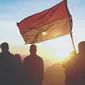 Ilustrasi bendera Indonesia. (Photo by crysia . on Unsplash)