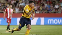 Selebrasi gol pemain Atletico Madrid, Jose Gimenez ke gawang Girona pada La Liga Spanyol di Montilivi stadium, Girona (19/8/2017). Atletico bermain imbang 2-2. (AFP/Pau Barrena)