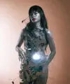 Tampil beda, penampilan Eva Celia sukses bikin pangling netizen di pemotretan terbarunya bersama fotografer Andy Tan. (Instagram/evacelia).