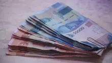 Ilustrasi uang rupiah. (Photo by Mufid Majnun on Unsplash)