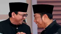 Basuki Tjahaja Purnama (Ahok) dan Abraham Lunggana (Haji Lulung) saat di Lebaran Betawi, Jakarta (14/9/2014) (Liputan6.com/Faisal R Syam)