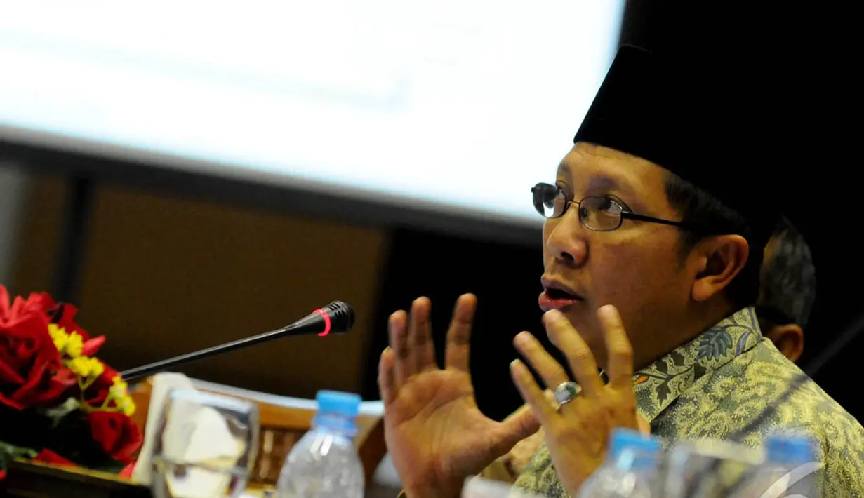 Lukman Hakim menegaskan, mundurnya ia sebagai anggota DPR RI terpilih periode 2014-2019 dari Partai Paersatuan Pembangunan (PPP) bukan karena ada tawaran dari Joko Widodo, Jakarta, Rabu (3/9/2014) (Liputan6.com/Andrian M Tunay) 