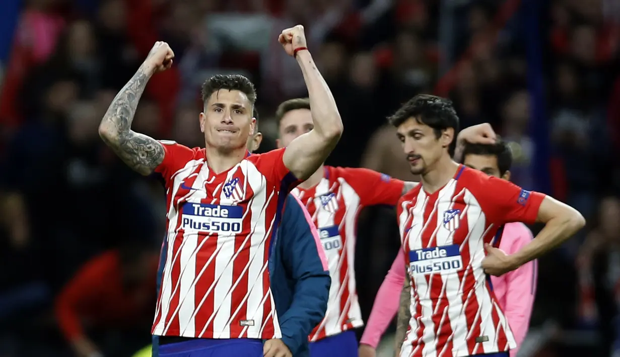 Pemain Atletico merayakan keberhasilan timnya lolos ke final Liga Europa usai mengalahkan Arsenal di Wanda Metropolitano stadium, Madrid, (3/5/2018). Atletico menang 1-0. (AP/Francisco Seco)