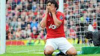 Manchester United's Brazilian defender Rafael Da Silva reacts after missing a chance to score during the EPL match against Queens Park Rangers at Old Trafford, on April 8, 2012. AFP PHOTO/ANDREW YATES