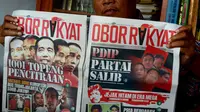 Pimpinan Redaksi Tabloid Obor Rakyat Setiyardi Budiono dan penulis Darmawan Sepriyossa mangkir dari panggilan perdana penyidik Bareskrim Mabes Polri. 