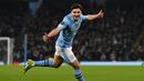 Pemain Manchester City, Julian Alvarez merayakan gol kedua timnya ke gawang FC Copenhagen pada laga leg kedua 16 besar Liga Champions 2023/2024 di Stadion Etihad, Manchester, Inggris, Kamis (07/03/2024). (AFP/Paul Ellis)