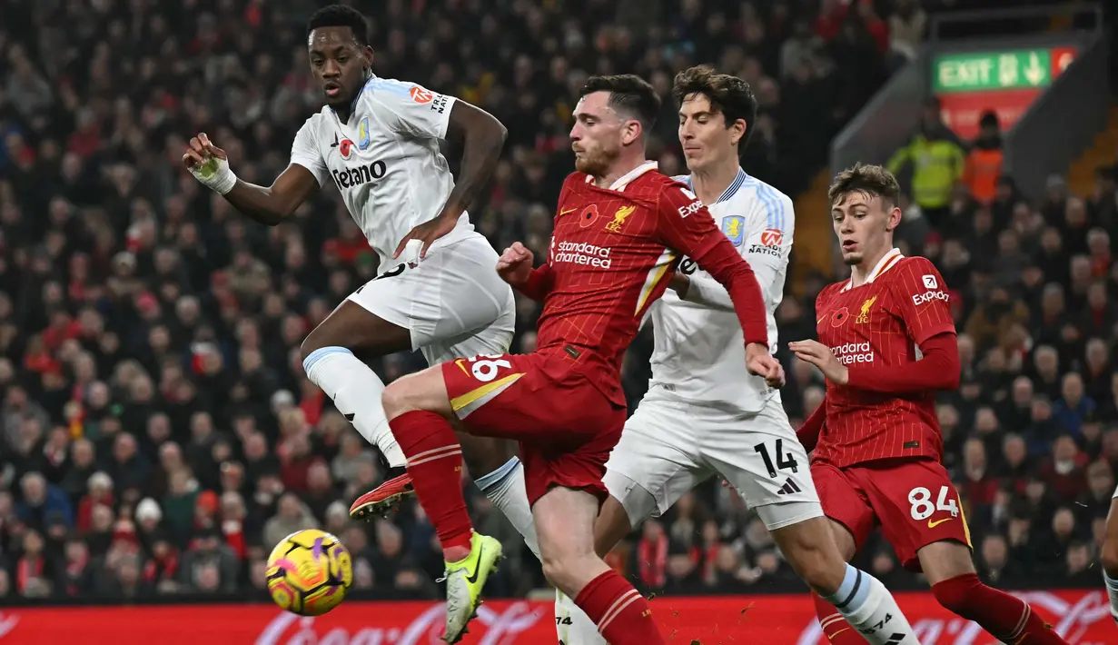 Tampil meyakinkan di kandang sendiri, Liverpool sukses menggilas Aston Villa dengan skor 2-0. (Paul ELLIS/AFP)