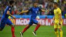 Ekspresi pemain Prancis, Dimitri Payet, setelah mencetak gol kemenangan atas Rumania dalam laga Grup A Piala Eropa 2016 di Stade de France, Saint-Denis, Prancis, (10/6/2016). (AFP/Franck Fife)