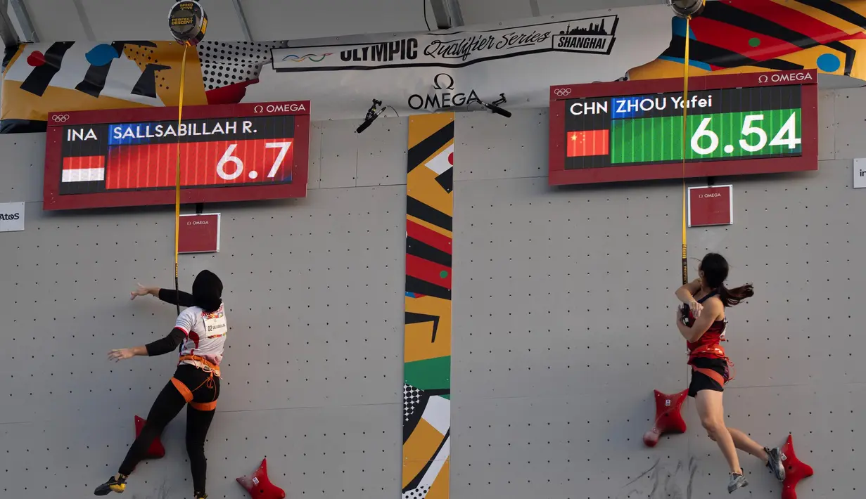 Rajiah Salbillah kalah dari atlet tuan rumah China, Zhou Y, atlet speed asal tuan rumah China. (AP Photo/Ng Han Guan)