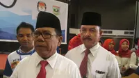 Muslim Kasim dan Fauzi Bahar usai debat kandidat calon gubernur dan wakil gubernur Sumbar. (Liputan6.com/Muslim AR)