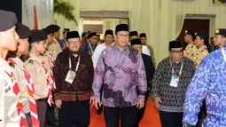 Menteri Agama Lukman Hakim Saifudin (tengah) saat tiba untuk membuka Munas VIII Lembaga Dakwah Islam Indonesia di Jakarta, Selasa (8/11). Munas bertujuan membangun perpektif baru dalam kehidupan berbangsa dan bernegara. (Liputan6.com/Helmi Fithriansyah)