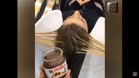 Perawatan rambut rusak dengan cokelat Nutella. (Video Screen Grab)