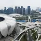 Foto udara pada 1 April 2022 menunjukkan Stadion Pusat Olahraga Olimpiade Hangzhou (kiri) dan Pusat Tenis Pusat Olahraga Olimpiade Hangzhou (kanan), tempat penyelenggaraan Asian Games ke-19, di Hangzhou di provinsi Zhejiang timur China. (STR / AFP)