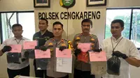 Polsek Cengkareng menangkap seorang pria inisial RN (40) atas tuduhan pemerasan kepada pengusaha minimarket di Jakarta Barat. (Foto: Istimewa).