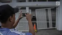 Pintu masuk zona 9 Stadion Utama Gelora Bung Karno yang rusak (Liputan6.com/Faizal Fanani)