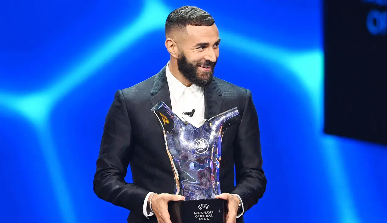 Benzema berhasil mengantar Real Madrid meraih total empat gelar. Empat gelar itu adalah Liga Spanyol, Piala Super Spanyol, Liga Champions, dan UEFA Supercup 2022. (AFP/Ozan Kose)