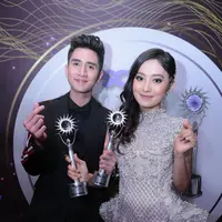 "Pastinya kita harus selalu memberikan yang terbaik dan akhir-akhir ini kan kurang tidur karena jadwalnya padat banget, jadi emang cape, sempat sakit, drop, tapi semuanya terbayarkan," jelasnya. (Adrian Putra/Bintang.com)