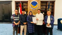 Penyerahan Rekomendasi Partai NasDem kepada bakal calon Bupati Tangerang dan Intan Nurul Hikmah sebagai bakal calon Wakil Bupati Tangerang dalam kontestasi Pilkada 2024. (Liputan6.com/Pramita Tristiawati)