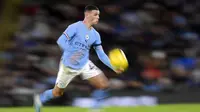 Petaka Chelsea masih belum usai di babak pertama. Pada menit ke-38, The Blues tertinggal 0-3 setelah Phil Foden sukses mengkonversi umpan tarik Kyle Walker dari sisi kanan menjadi gol. (AFP/Oli Scarff)