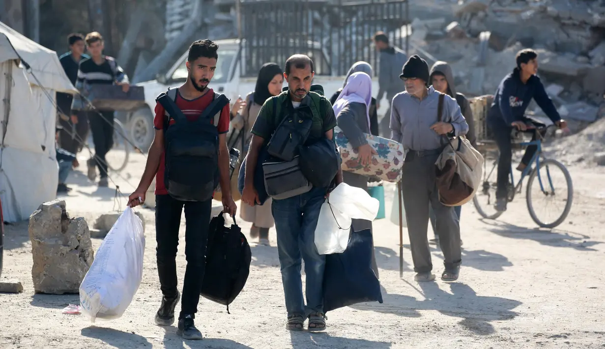 Israel juga memperingatkan warga di Gaza bahwa pasukannya akan menyerang area tersebut dengan kekuatan besar. (Bashar TALEB/AFP)